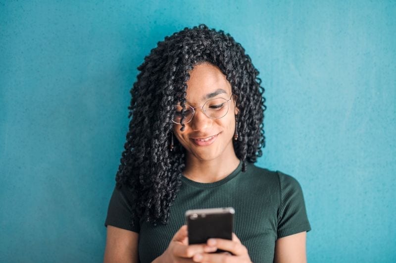 A person using EVOQ on their phone
