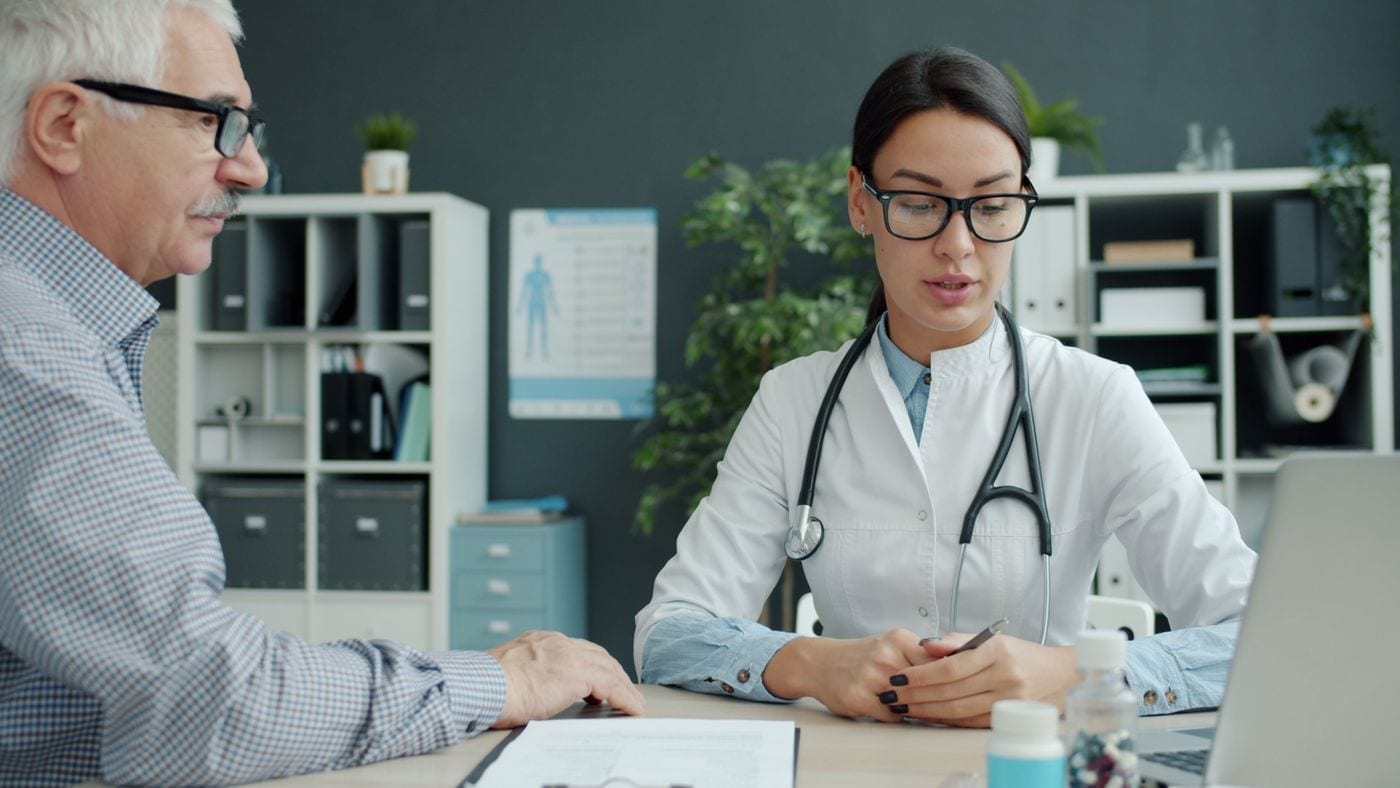 Doctor speaking with a patient