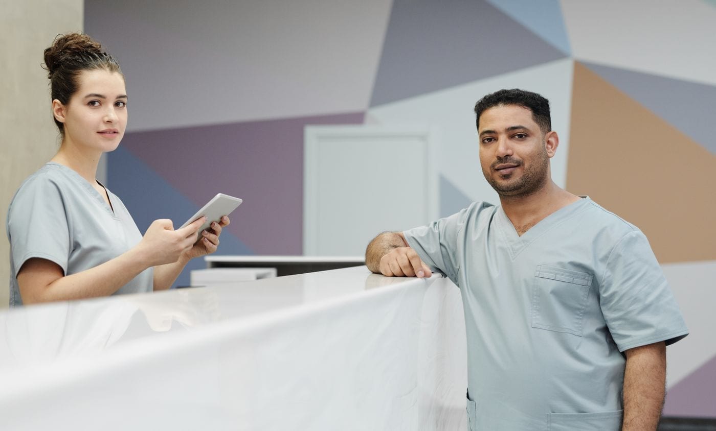 Receptionist welcoming a patient