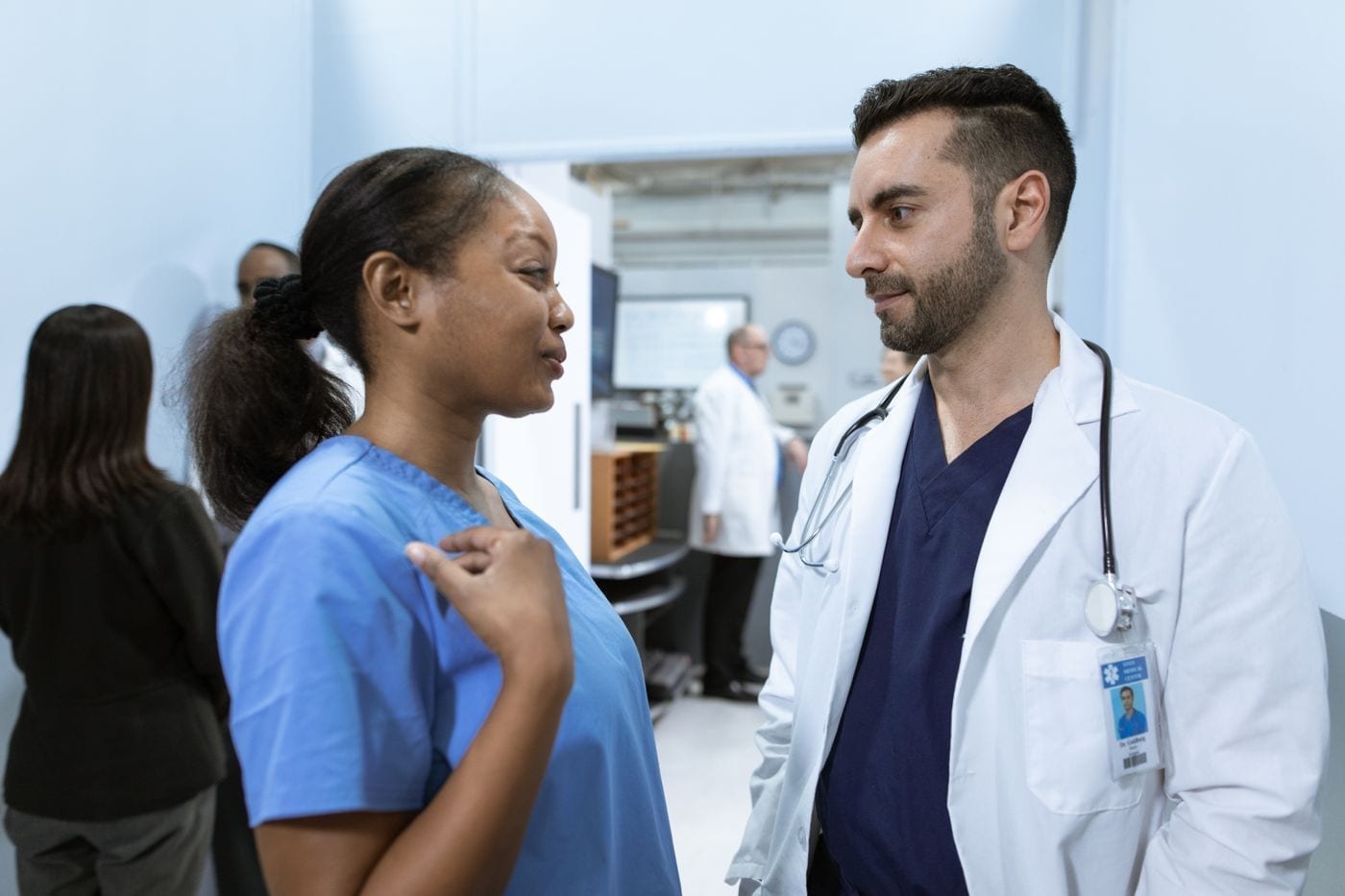 Doctor and nurse reviewing a patient record