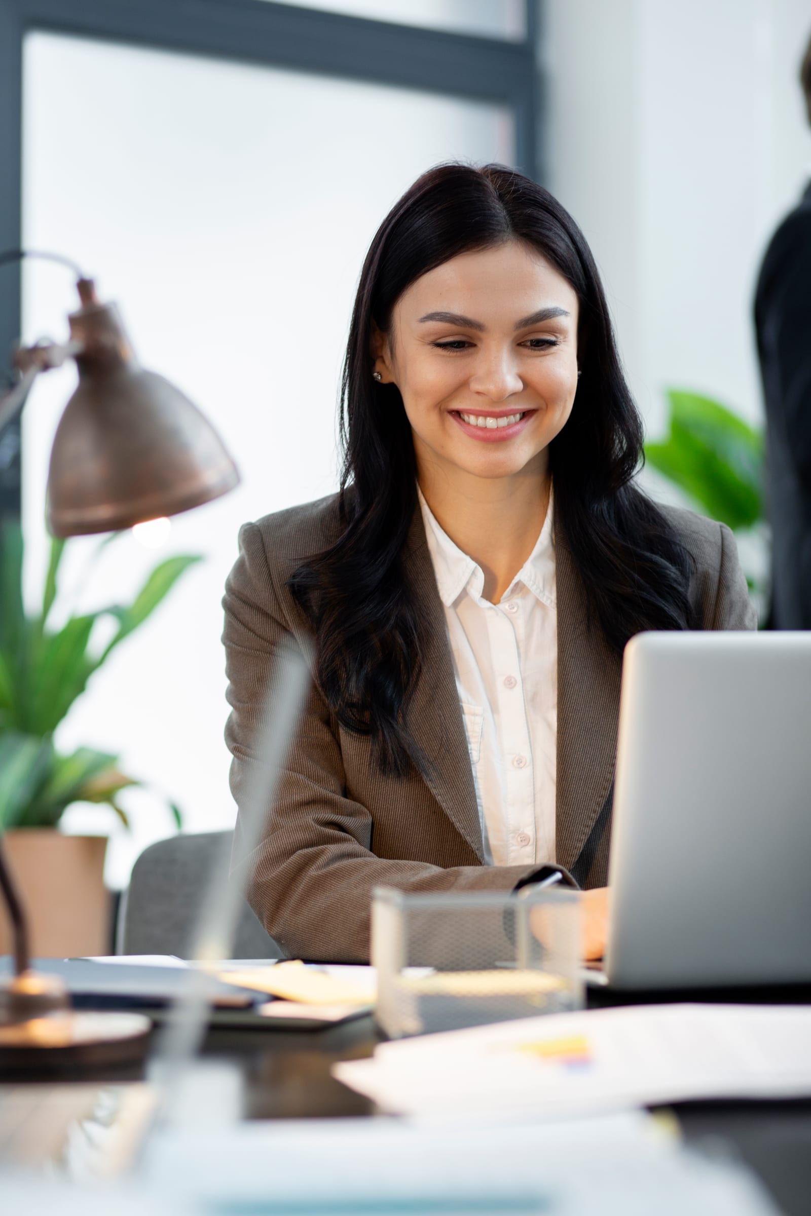 HR, managers, and employees collaborating in a modern office